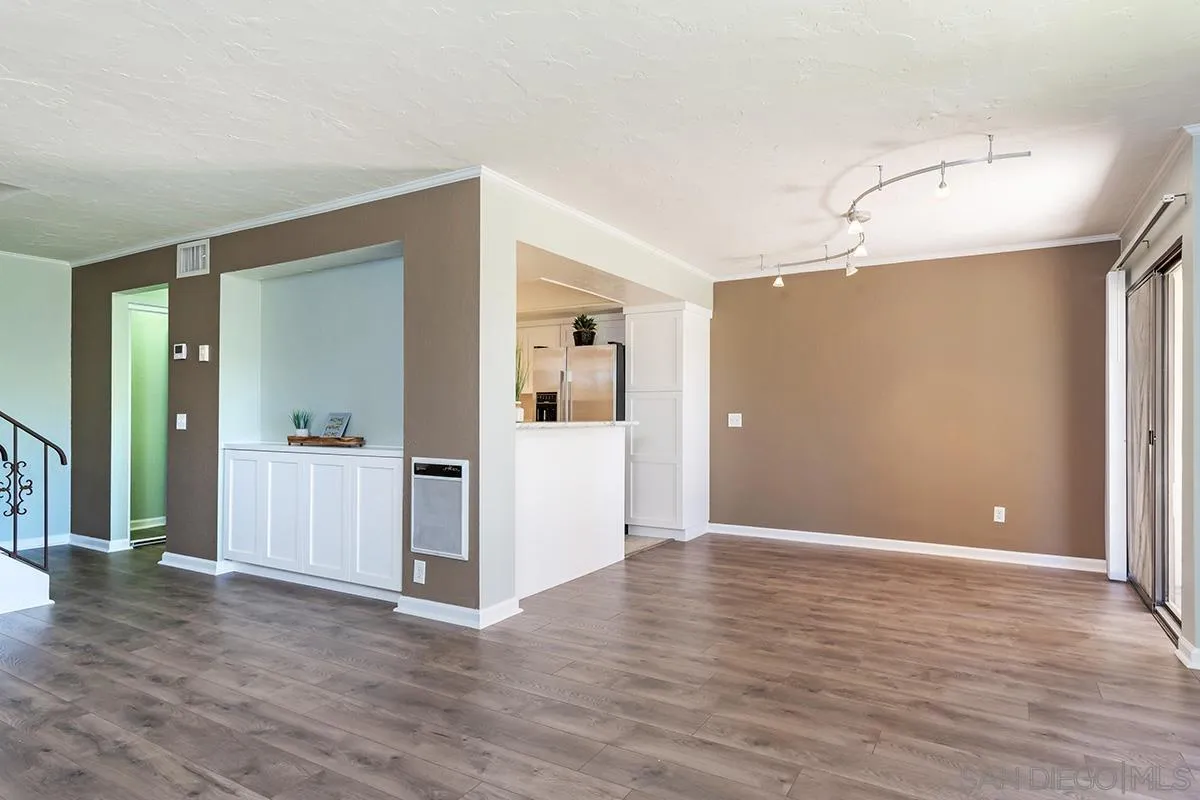705 Copper Drive Vista, CA 92083 - Photo 7 of 31 wooden floor in an empty room with a window
