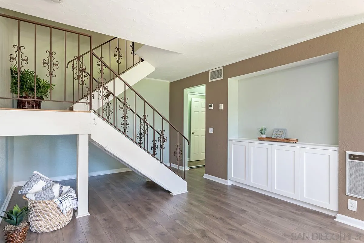 705 Copper Drive Vista, CA 92083 - Photo 10 of 31 a view of entryway with wooden floor