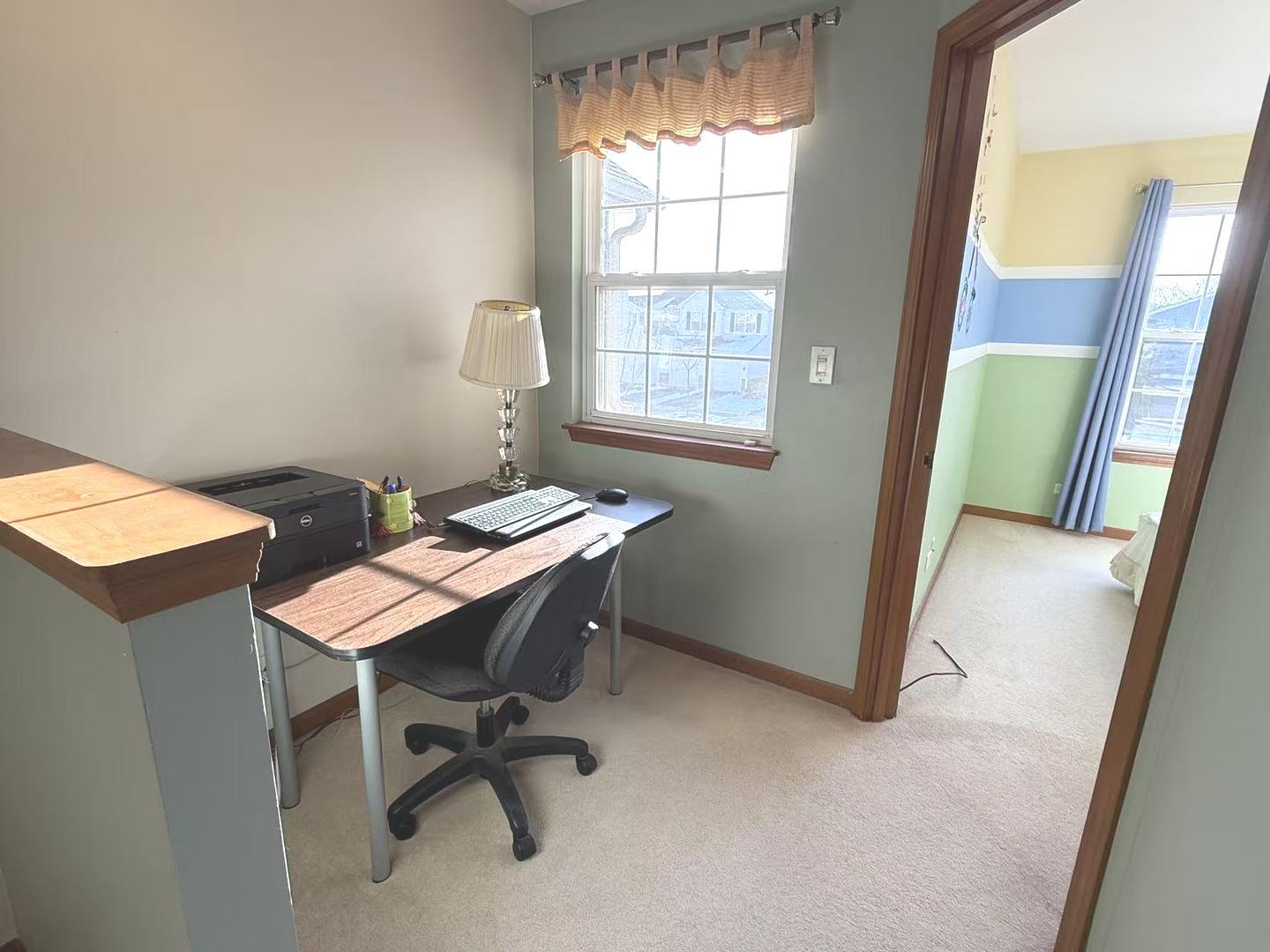 864 Genesee Drive Naperville, IL 60563 - Photo 11 of 31 a view of a workspace with furniture and a window