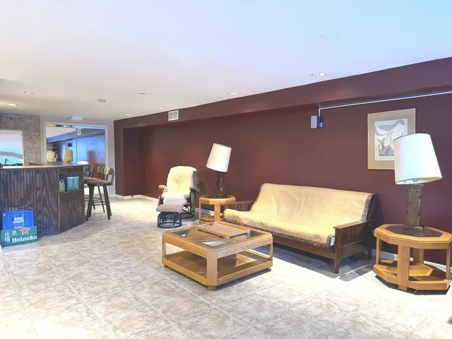 a living room with furniture and a table