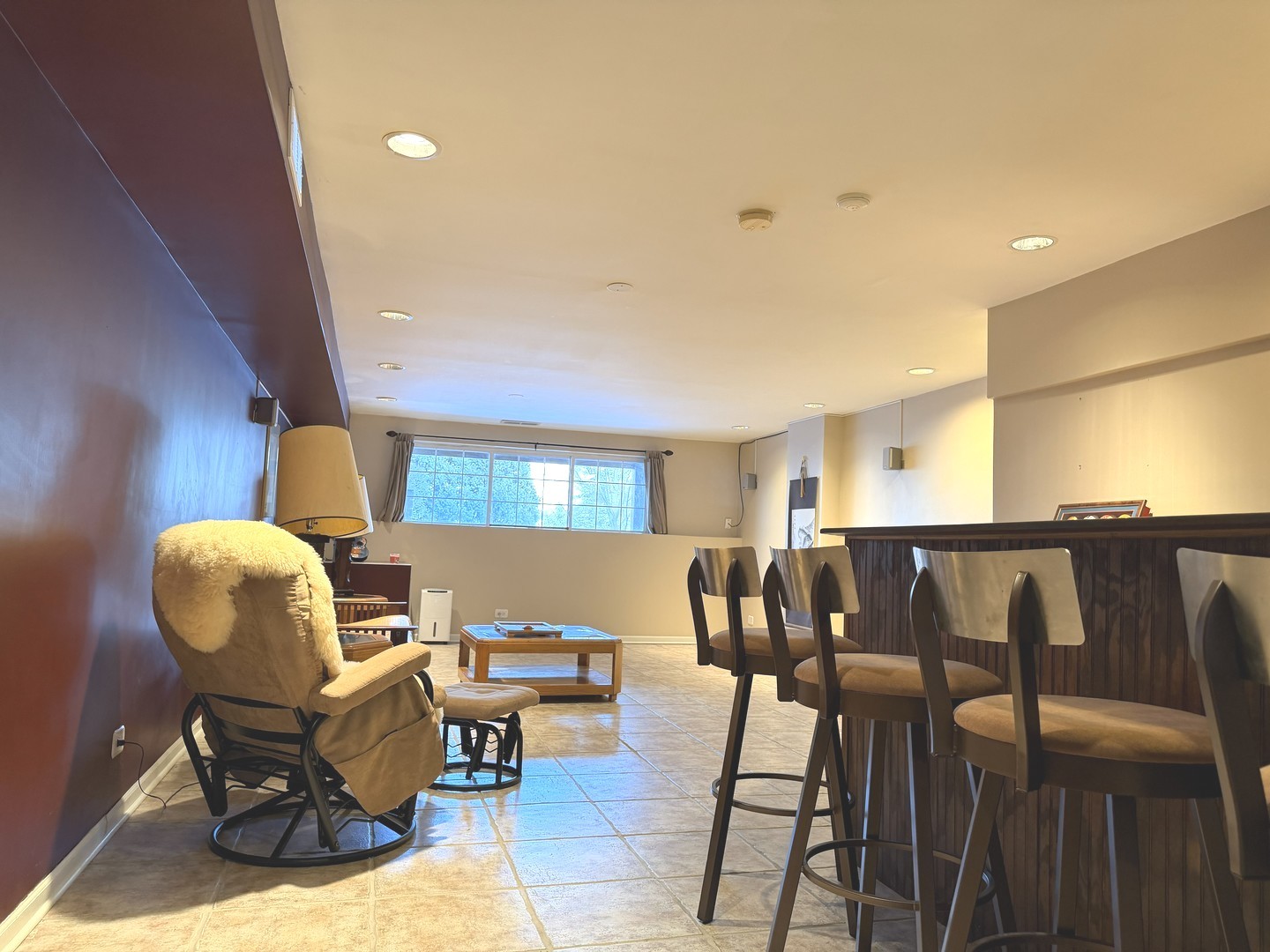 864 Genesee Drive Naperville, IL 60563 - Photo 25 of 31 a living room with chairs and wooden floor