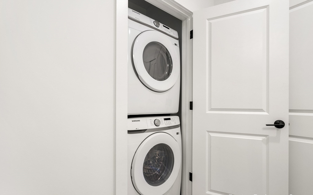 600 Broadway, Unit 509 Chelsea, MA 02150 - Photo 3 of 21 a utility room with dryer and washer