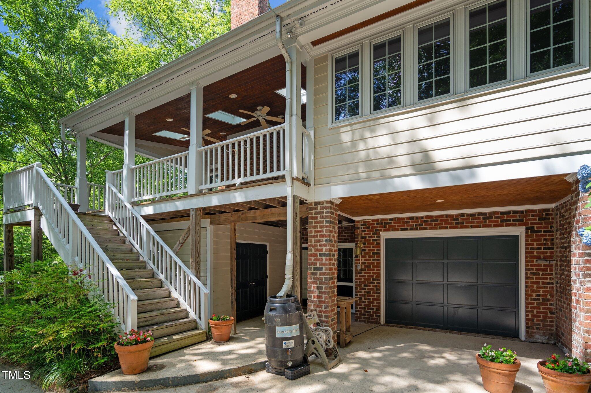 2113 Fallon Oaks Court Raleigh, NC 27608 - Photo 23 of 23 Exterior with storage and garage