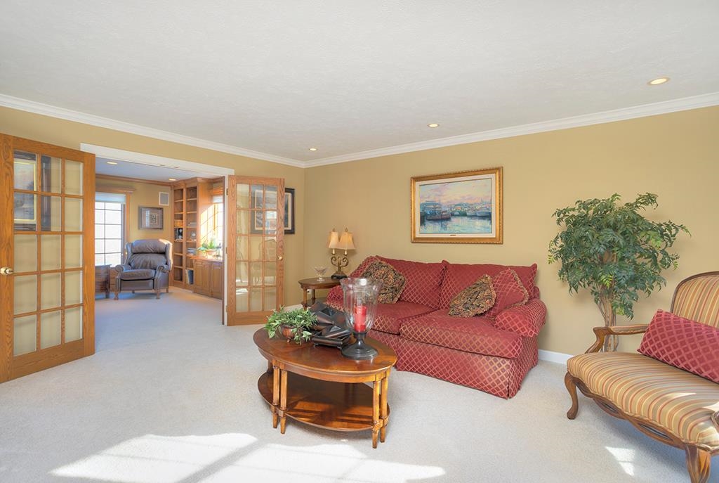 966 Spring Ridge Court Belvidere, IL 61008 - Photo 17 of 44 a living room with furniture and a large window