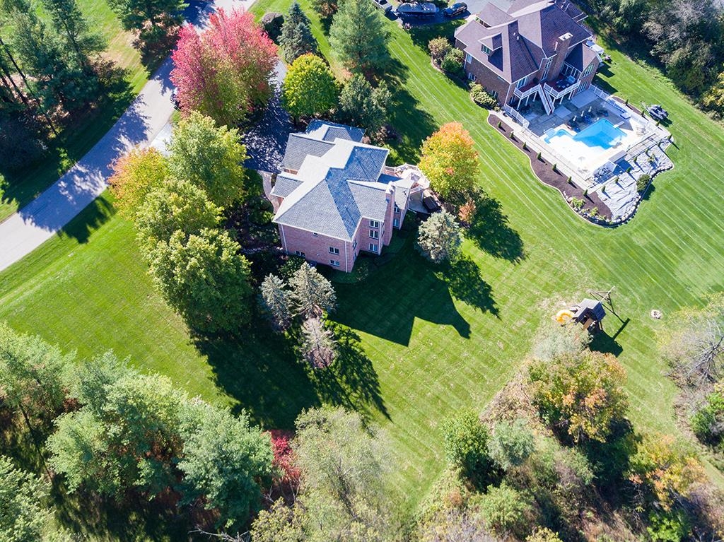 966 Spring Ridge Court Belvidere, IL 61008 - Photo 38 of 44 an aerial view of a house with a yard