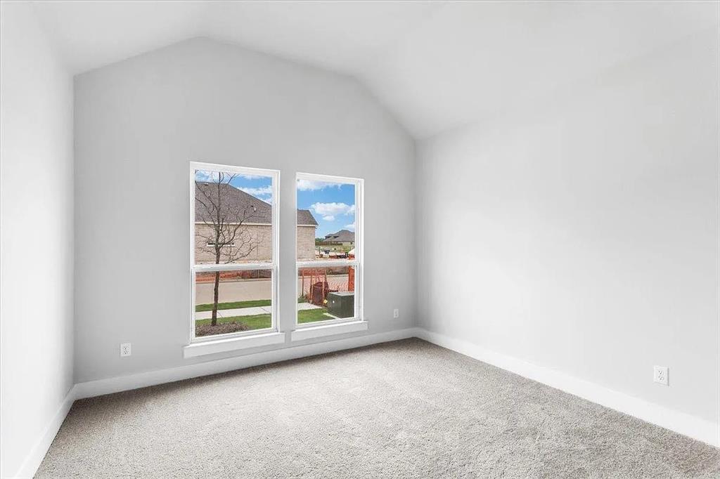 6246 Shasta Creek Road Celina, TX 75009 - Photo 22 of 24 an empty room with windows