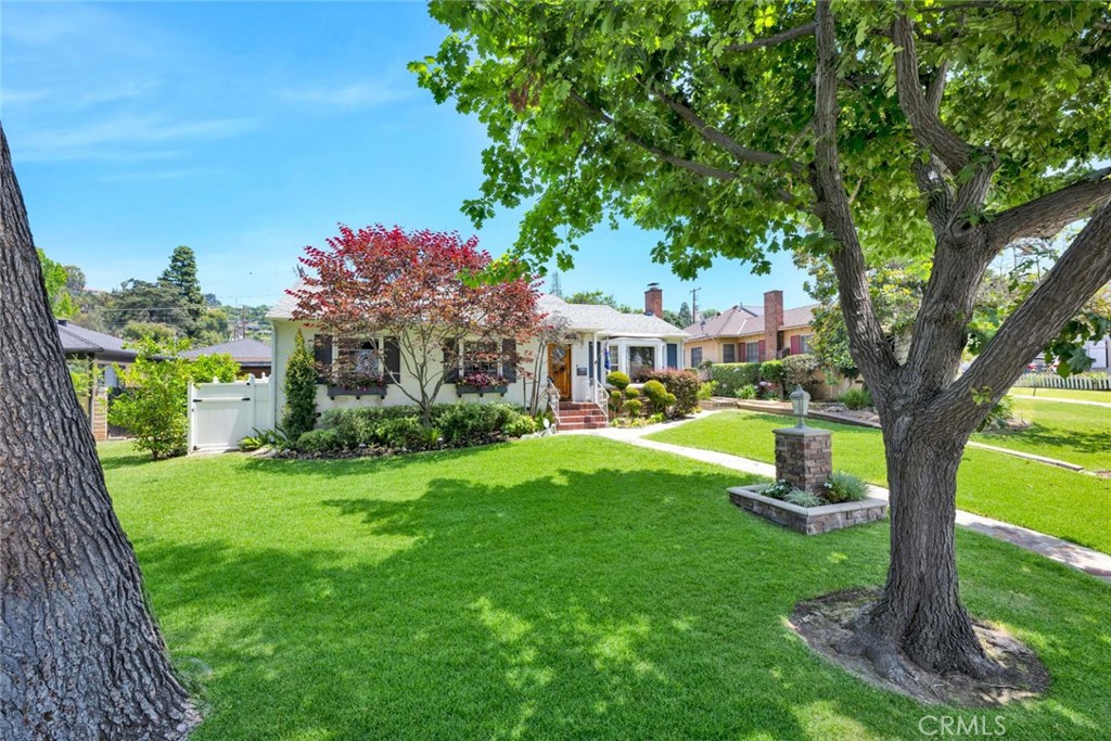 5456 Cadbury Road Whittier, CA 90601 - Photo 66 of 67 a front view of a house with garden