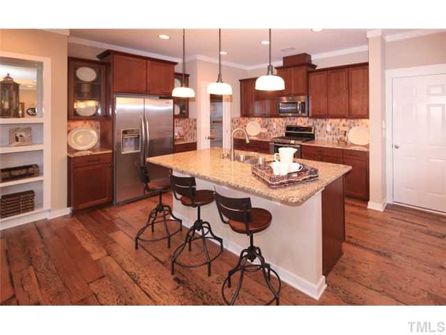 9104 Murrillo Walk Raleigh, NC 27617 - Photo 3 of 12 Beautiful open kitchen! Chef's dream kitchen! Photo is not of actual home.