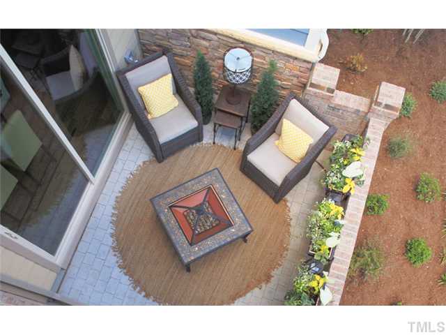 9104 Murrillo Walk Raleigh, NC 27617 - Photo 6 of 12 Relax after a long day on your own private courtyard. Photo is not of actual home