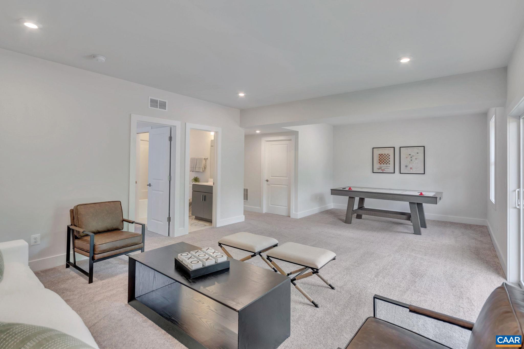22 A Wardell Crest Charlottesville, VA 22902 - Photo 24 of 31 a living room with furniture and a rug