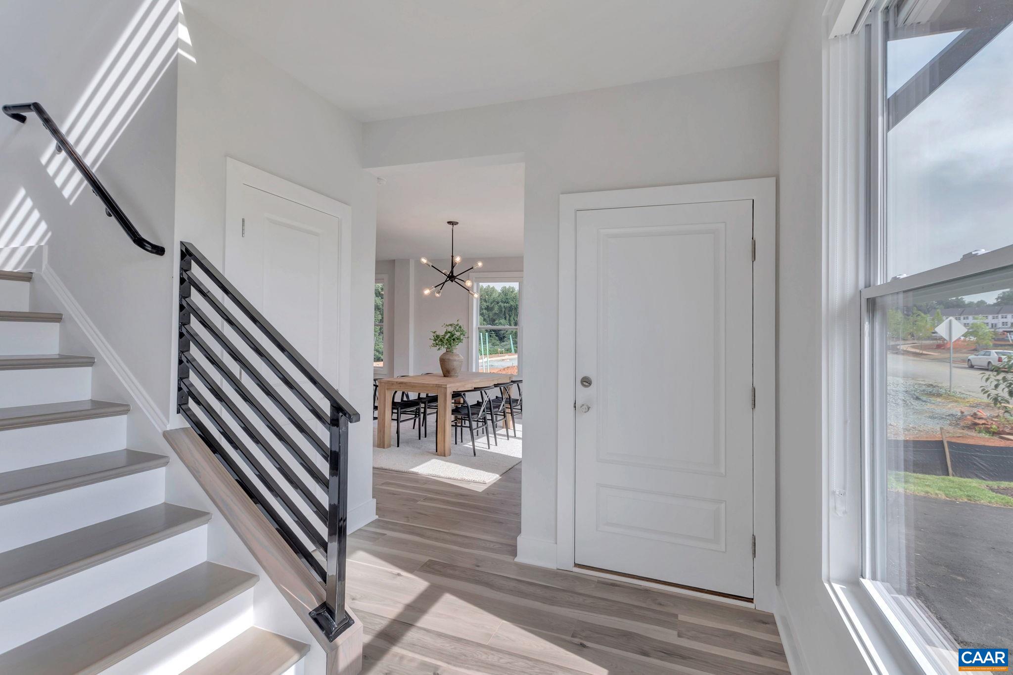 22 A Wardell Crest Charlottesville, VA 22902 - Photo 6 of 31 a view of entryway and hall with wooden floor