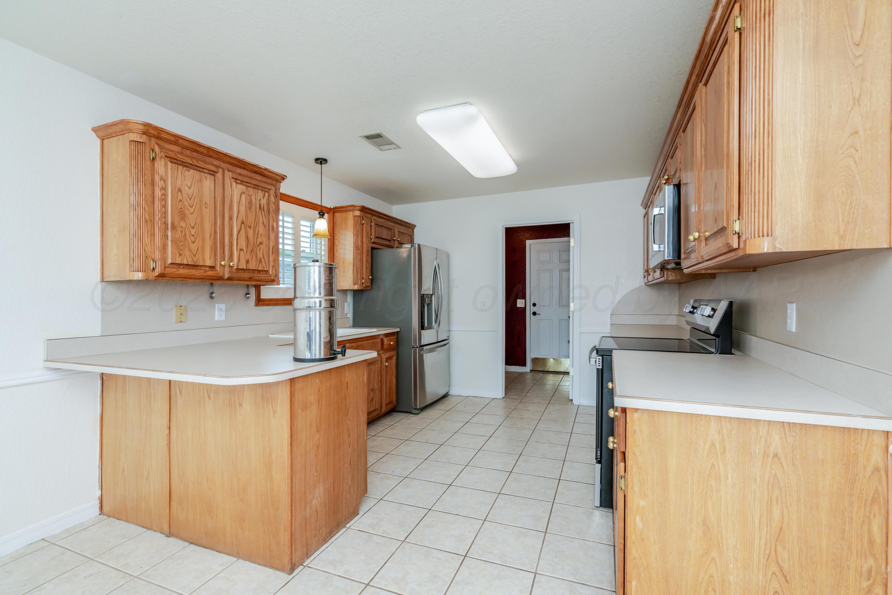 6108 Rutgers Street Amarillo, TX 79109 - Photo 9 of 32 Kitchen 1