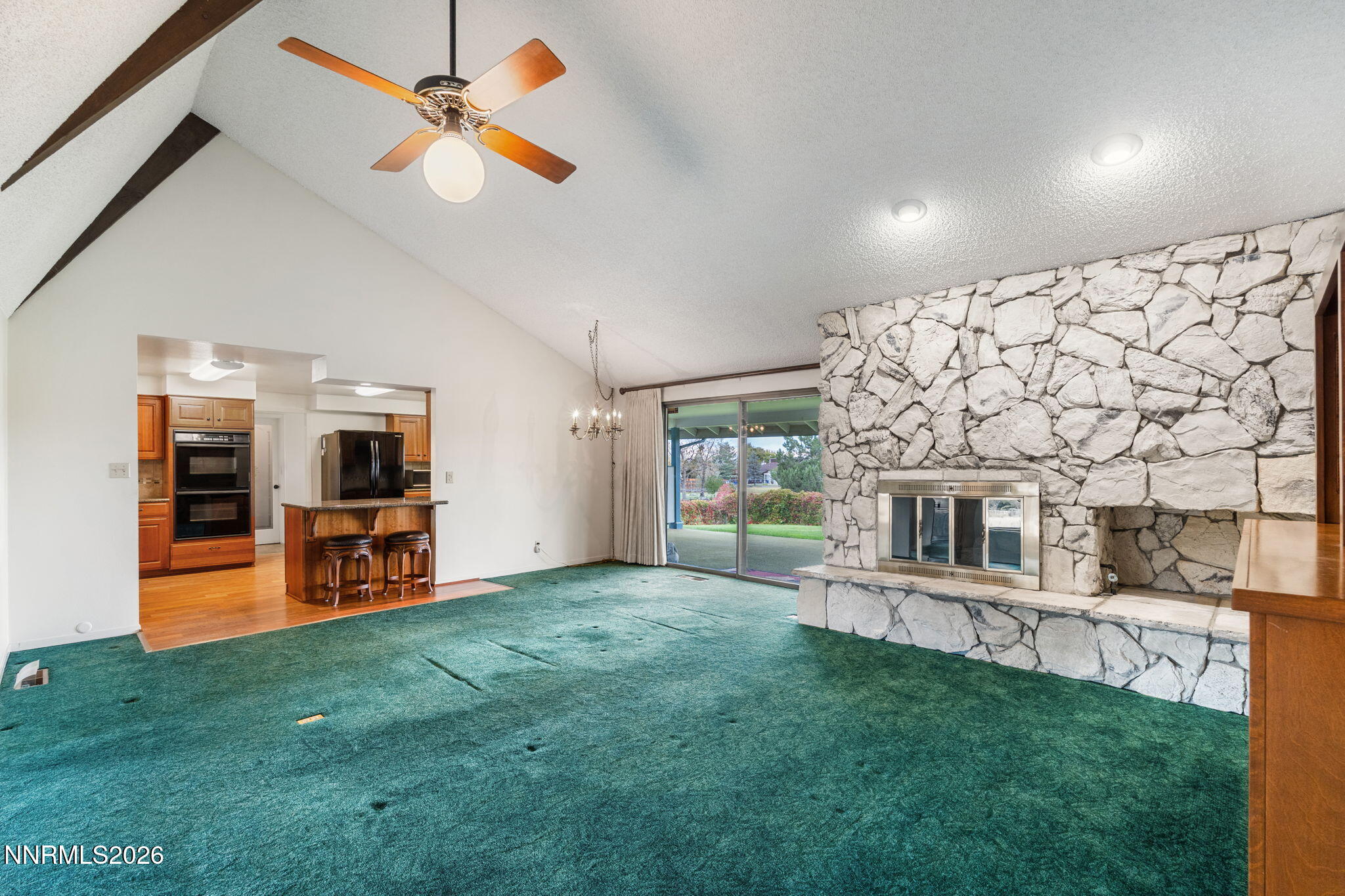 4045 Inverness Drive Reno, NV 89502 - Photo 15 of 34 20-Family Room - Stone Fireplace & Kitch