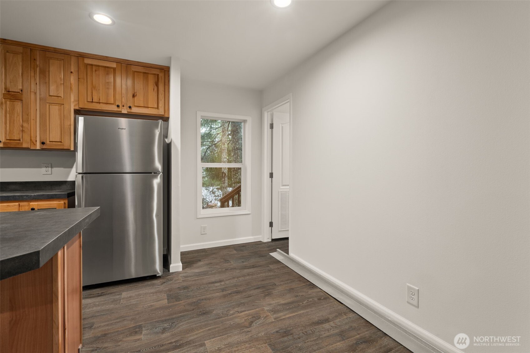 175 Boyd Road Randle, WA 98377 - Photo 13 of 26 a view of a kitchen with a refrigerator a stove top oven and a refrigerator