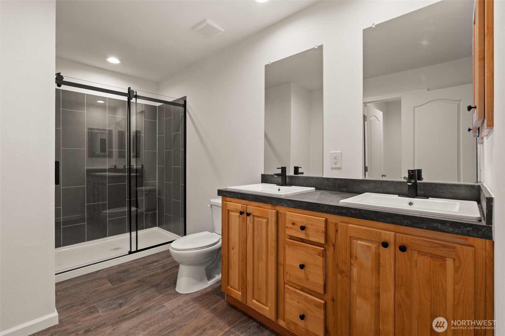 175 Boyd Road Randle, WA 98377 - Photo 15 of 26 a bathroom with a granite countertop sink mirror and toilet