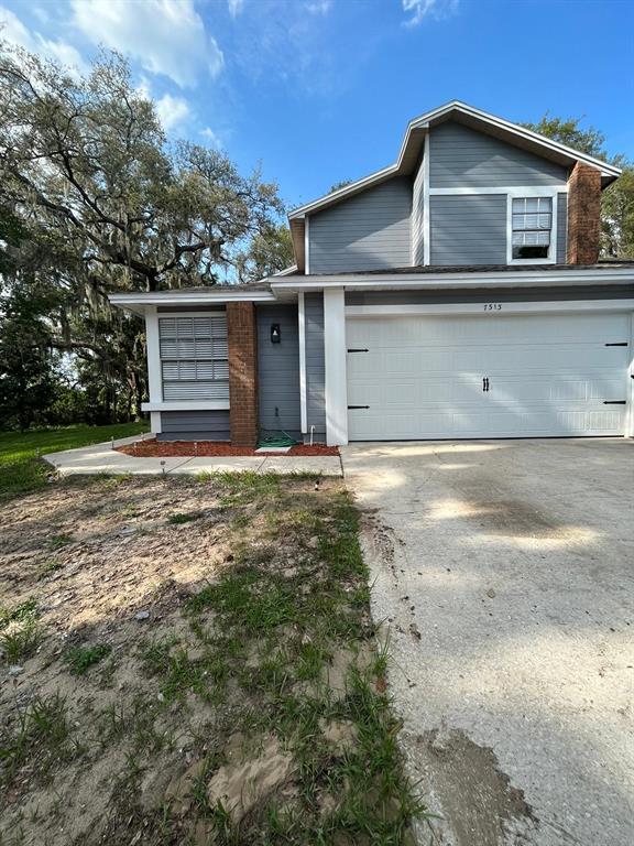 a house with yard in front of it