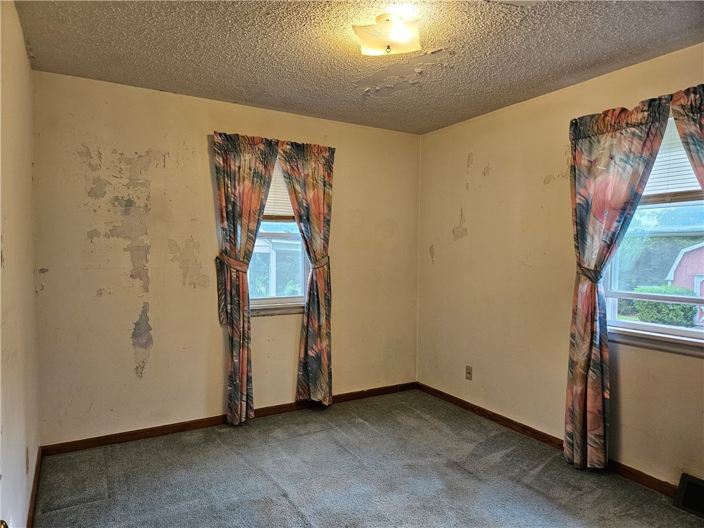 175 Airport Road Decatur, IL 62521 - Photo 13 of 33 Main floor bedroom