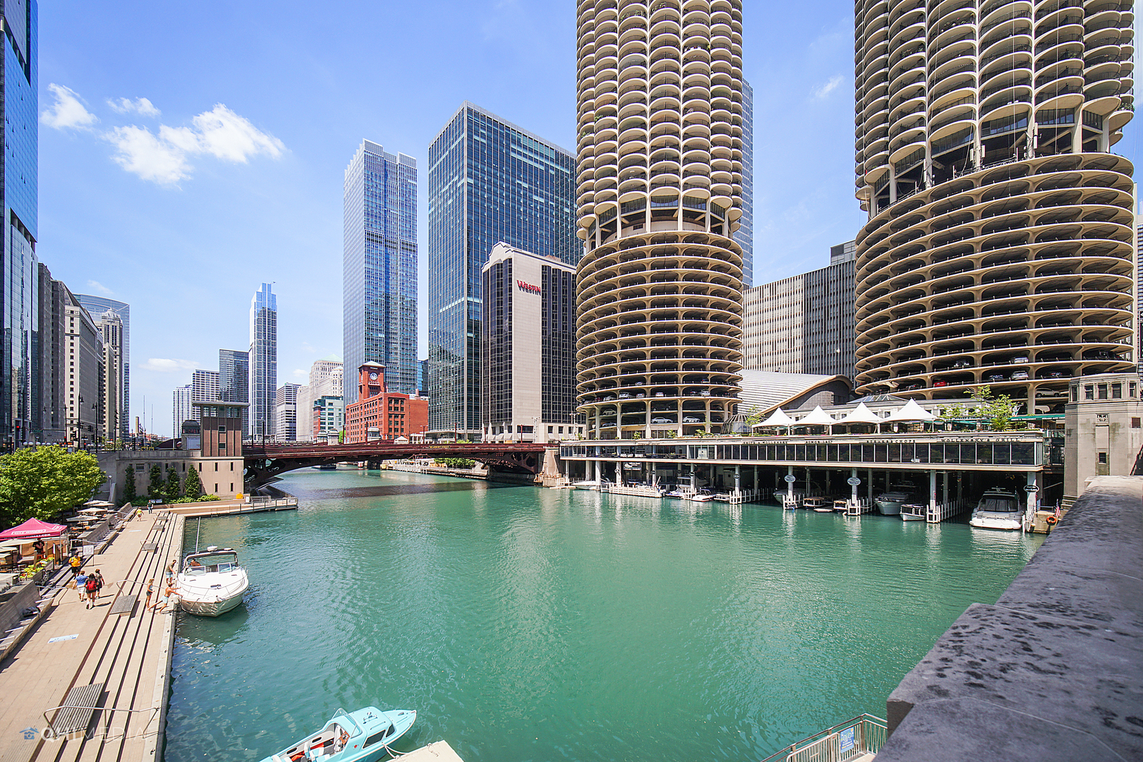 a view of a lake with tall buildings