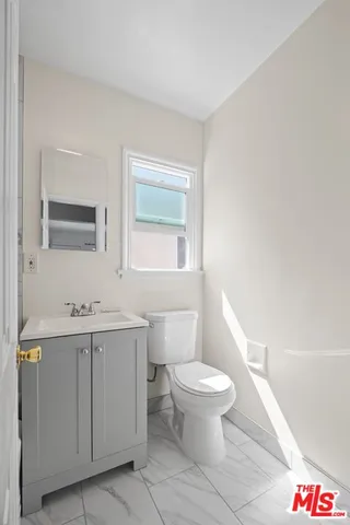 a bathroom with a sink and a bathtub