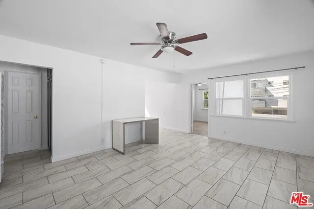 a view of an empty room and window