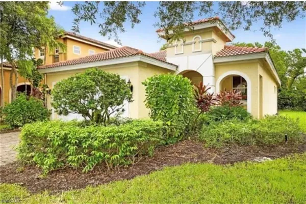 a front view of a house with a garage