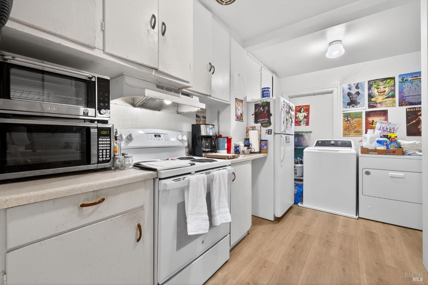 689 Plum Drive Santa Rosa, CA 95404 - Photo 13 of 26 a kitchen with cabinets and steel stainless steel appliances