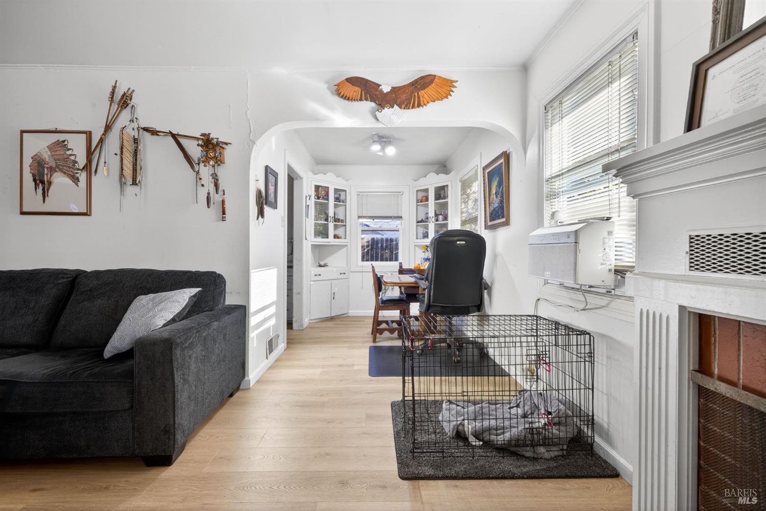 689 Plum Drive Santa Rosa, CA 95404 - Photo 8 of 26 a living room with furniture and a fireplace
