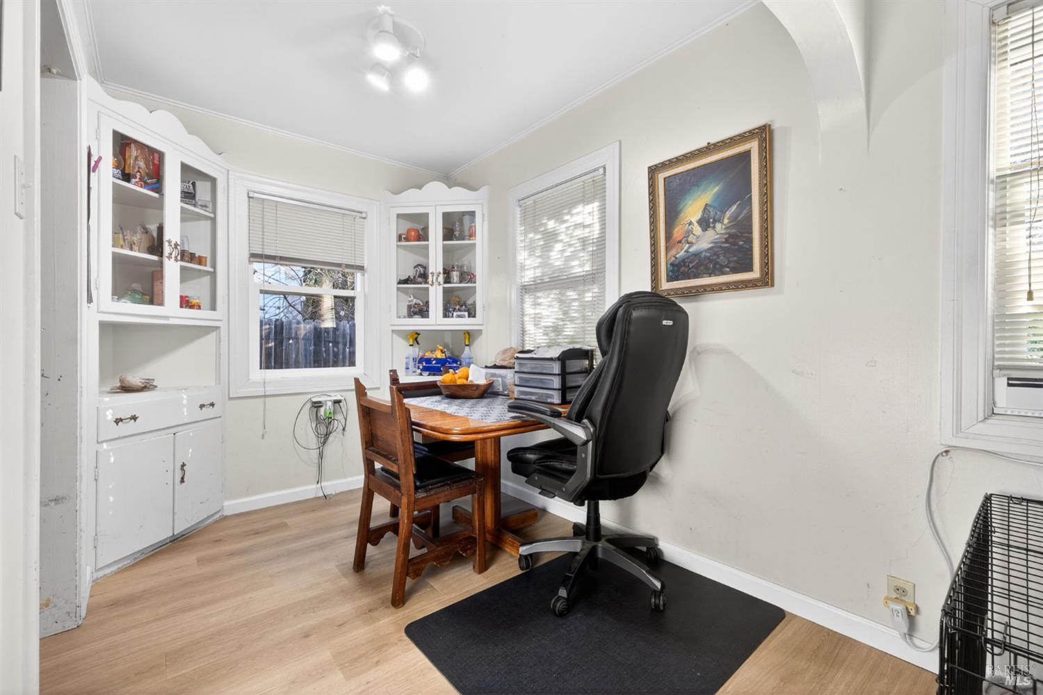 689 Plum Drive Santa Rosa, CA 95404 - Photo 9 of 26 a view of a workspace with furniture and a window