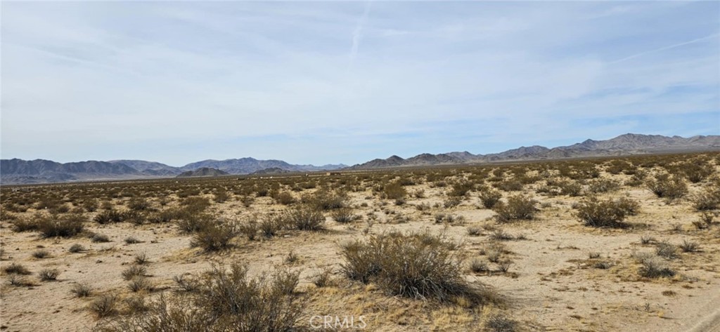 a view of lake and mountain