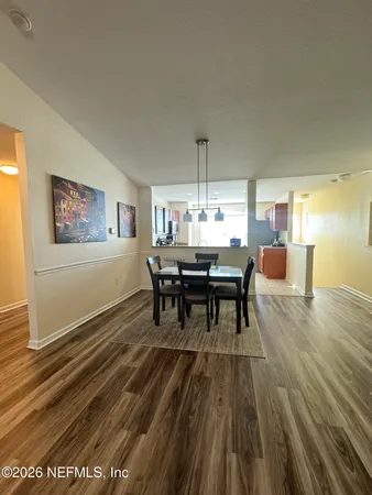 a view of a dining room with furniture