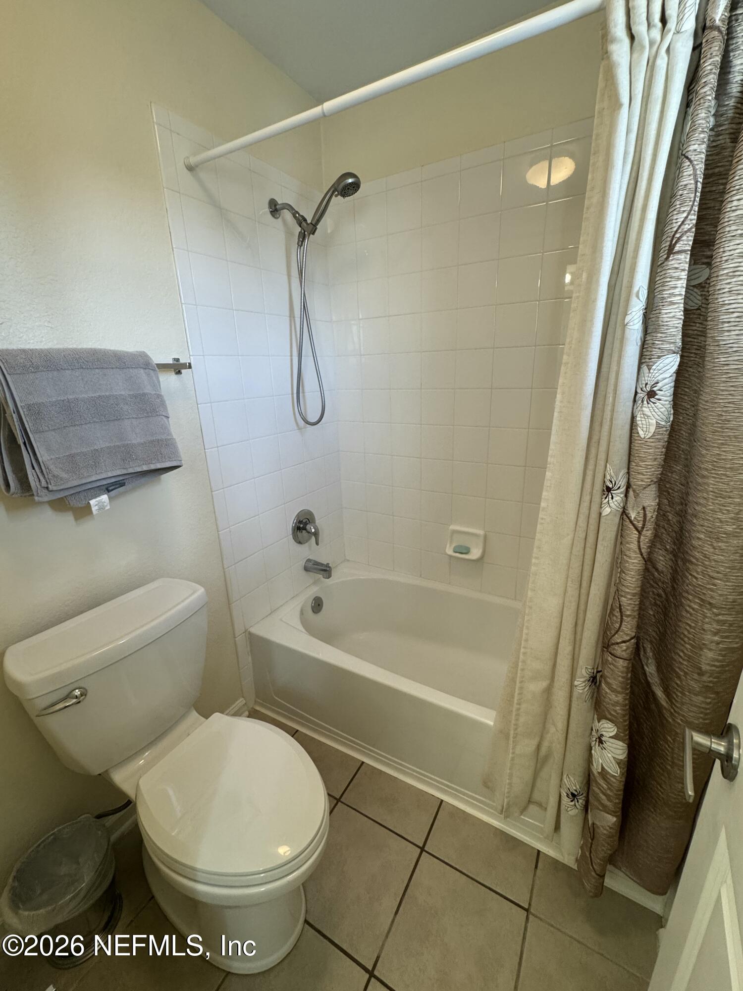 10200 Belle Rive Boulevard, Unit 3603 Jacksonville, FL 32256 - Photo 17 of 19 a bathroom with a toilet and a shower