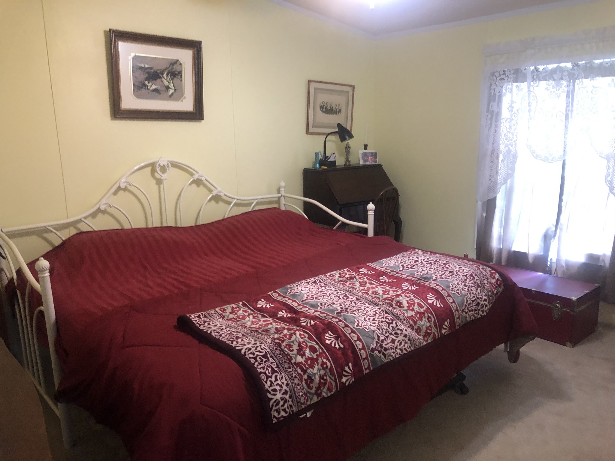 8063 Galen Road Lafayette, TN 37083 - Photo 18 of 18 a bedroom with a bed and a dresser