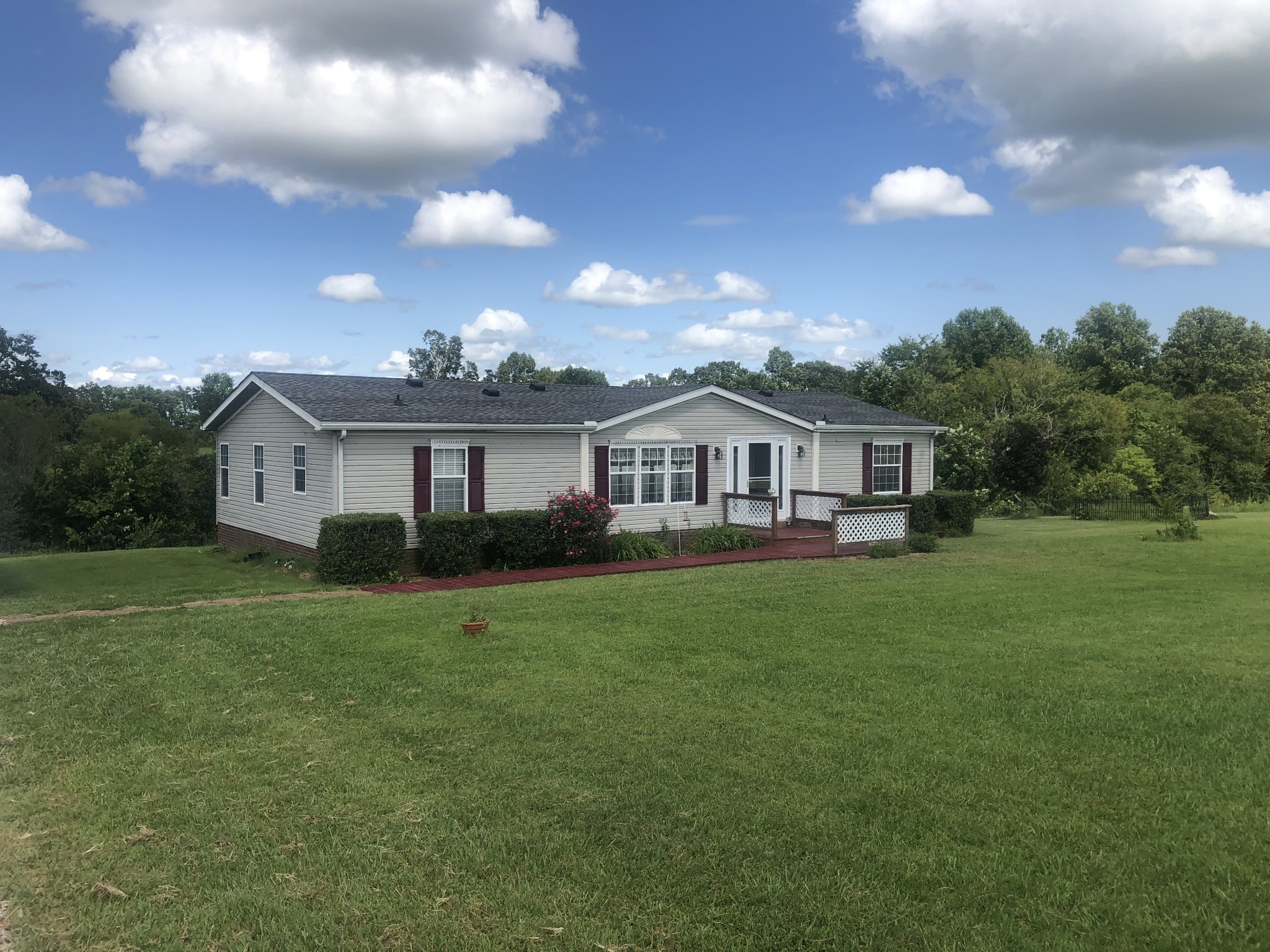 8063 Galen Road Lafayette, TN 37083 - Photo 3 of 18 a front view of house with yard and green space