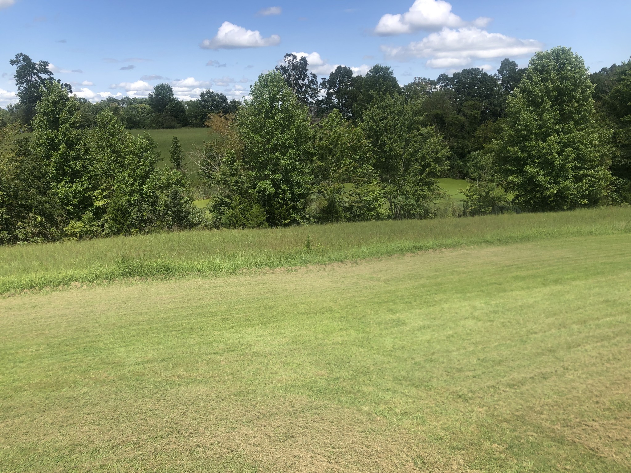 8063 Galen Road Lafayette, TN 37083 - Photo 5 of 18 a view of a field with an ocean