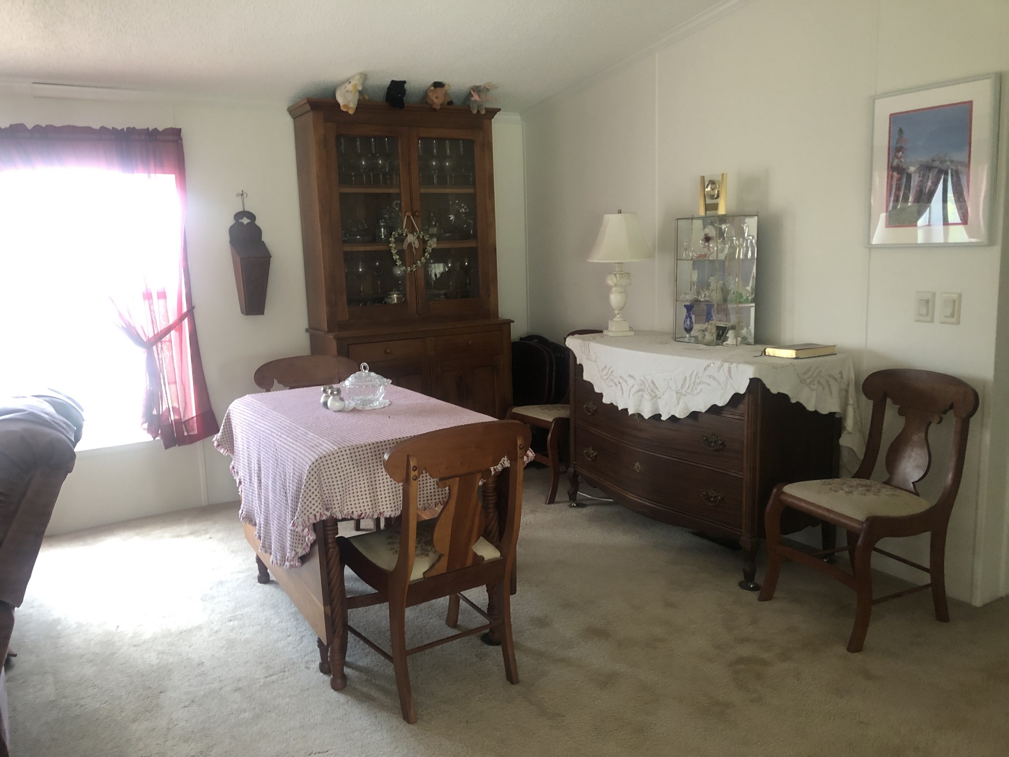 8063 Galen Road Lafayette, TN 37083 - Photo 10 of 18 a bedroom with a bed a table and chair