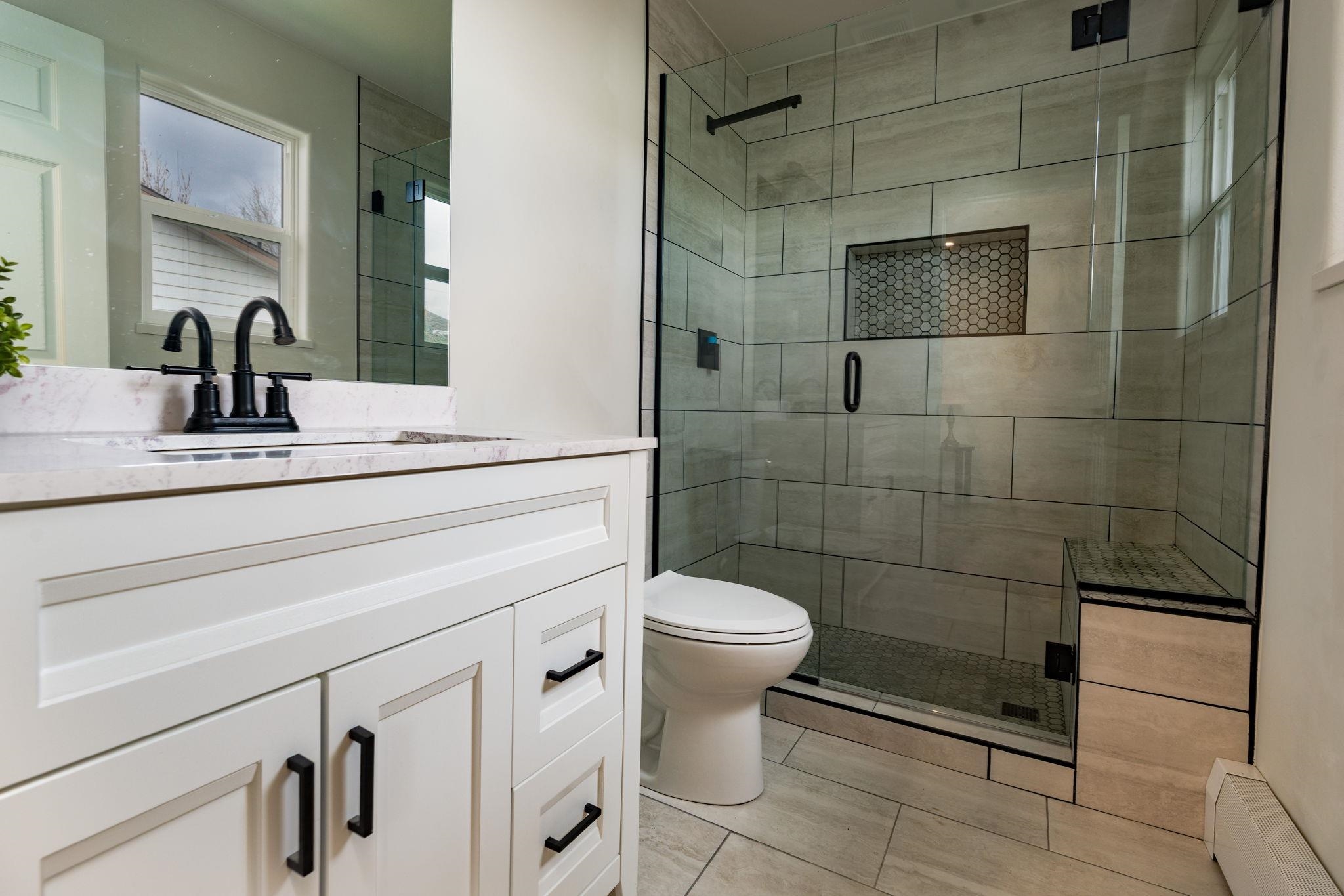 411 Cedar Glen Way Fruita, CO 81521 - Photo 14 of 25 a bathroom with a sink toilet and shower