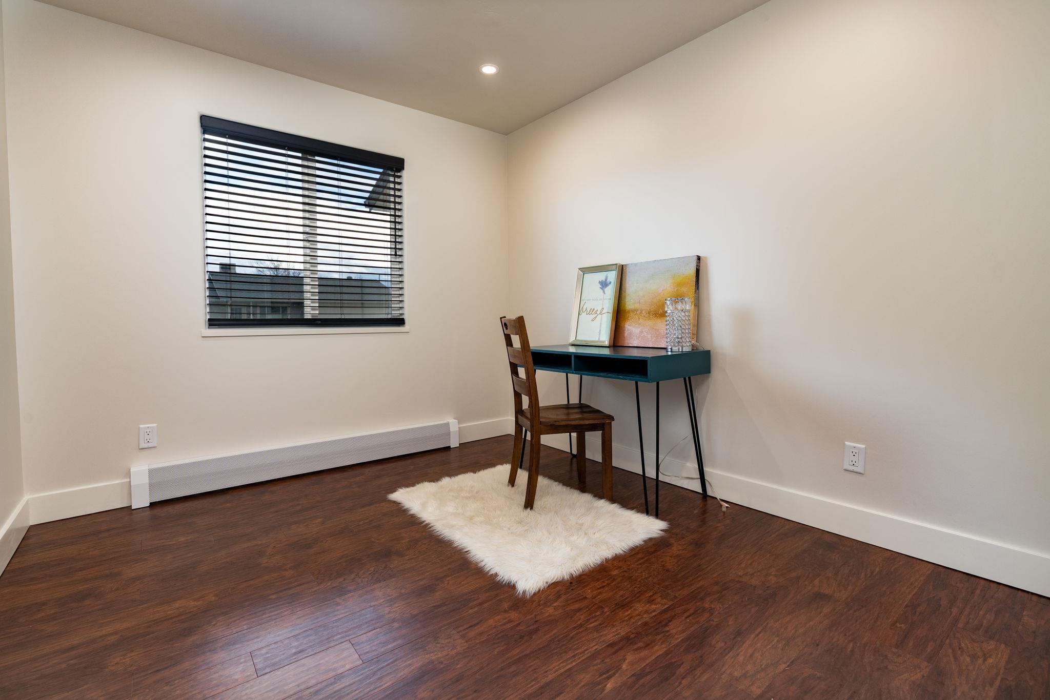 411 Cedar Glen Way Fruita, CO 81521 - Photo 17 of 25 a workspace with furniture and a window