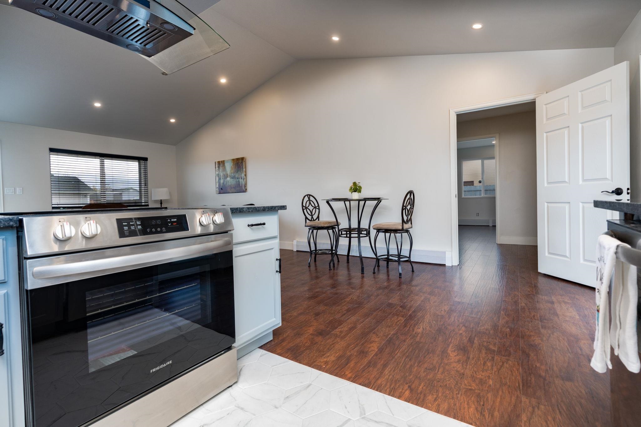 411 Cedar Glen Way Fruita, CO 81521 - Photo 7 of 25 a kitchen with sink microwave and stove