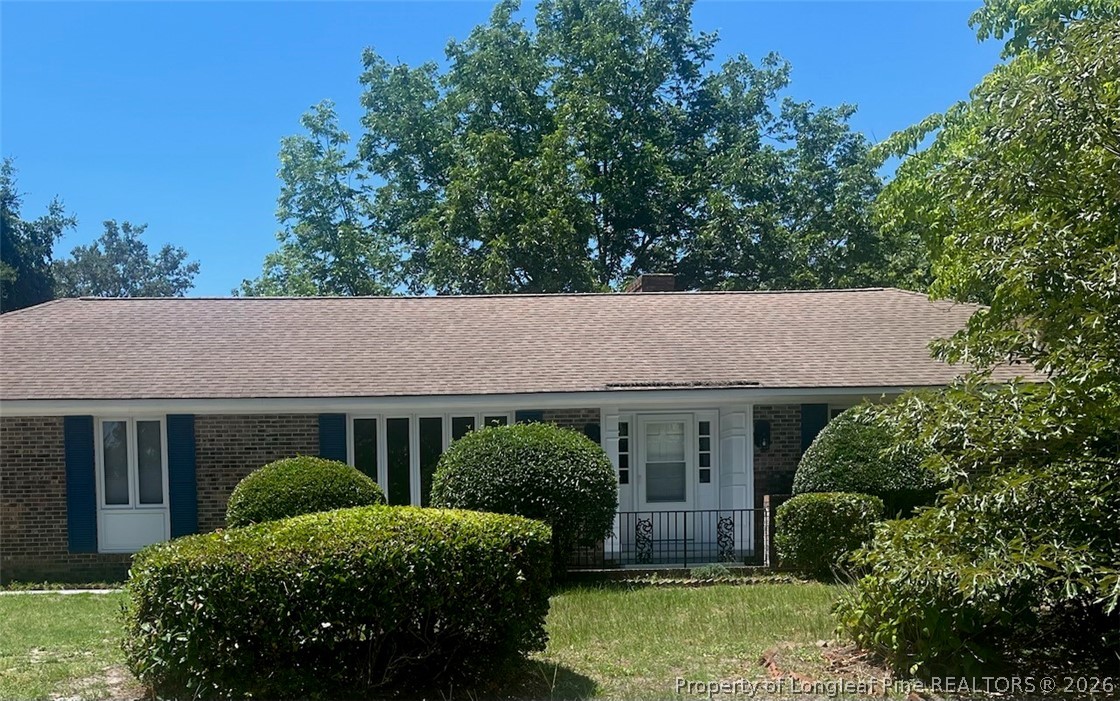 425 Dunmore Road Fayetteville, NC 28303 - Photo 2 of 21 a view of a house with a garden and plants
