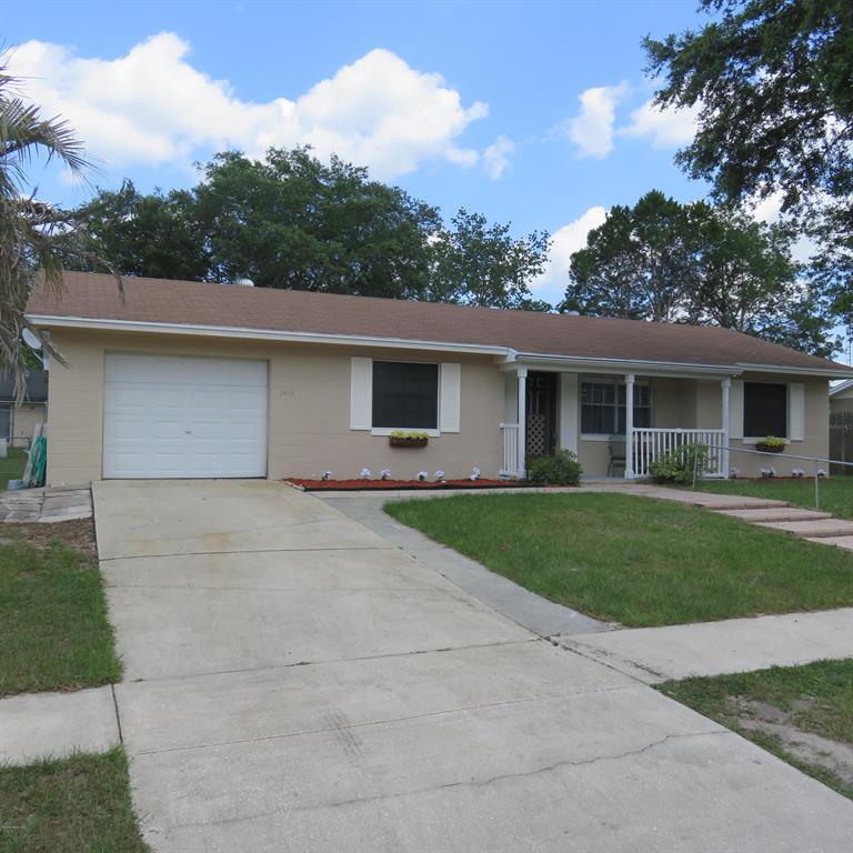 3445 Southwest 150th Lane Road Ocala, FL 34473 - Photo 1 of 1 front view of a house with a yard
