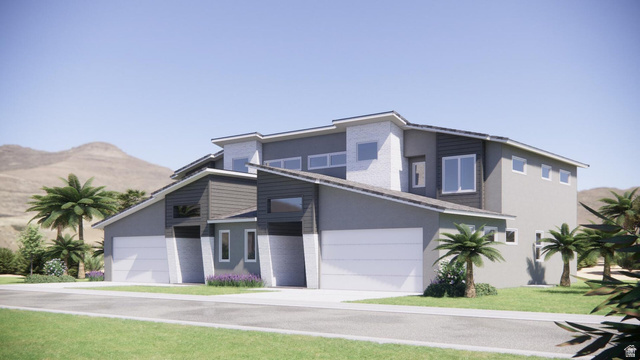 2972 West 570 North Hurricane, UT 84737 - Photo 98 of 104 Contemporary home featuring stucco siding, a garage, a front lawn, and a mountain view