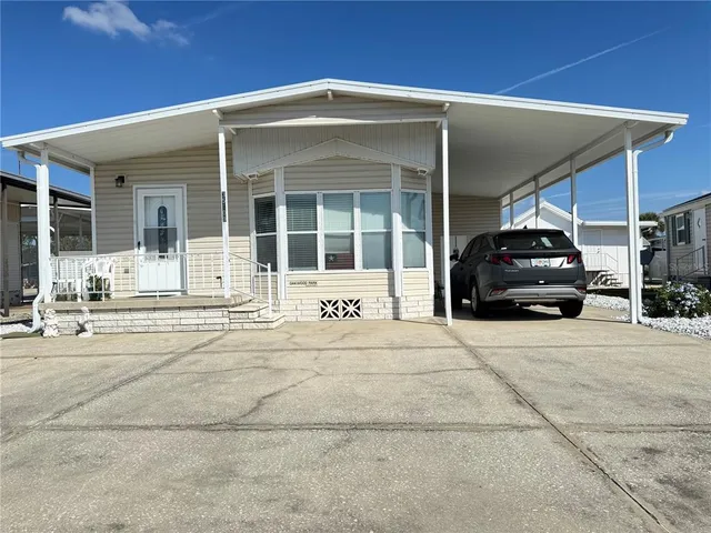 a car parked in front of a house