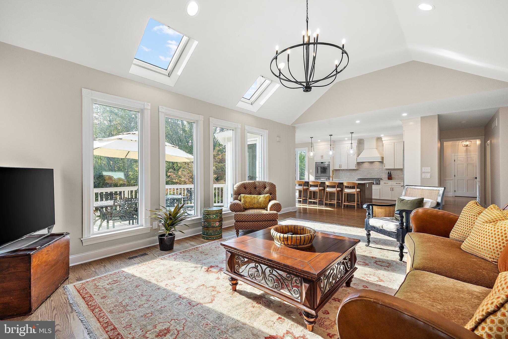 10 Pheasants Ridge North Wilmington, DE 19807 - Photo 13 of 69 a living room with furniture a flat screen tv and a window