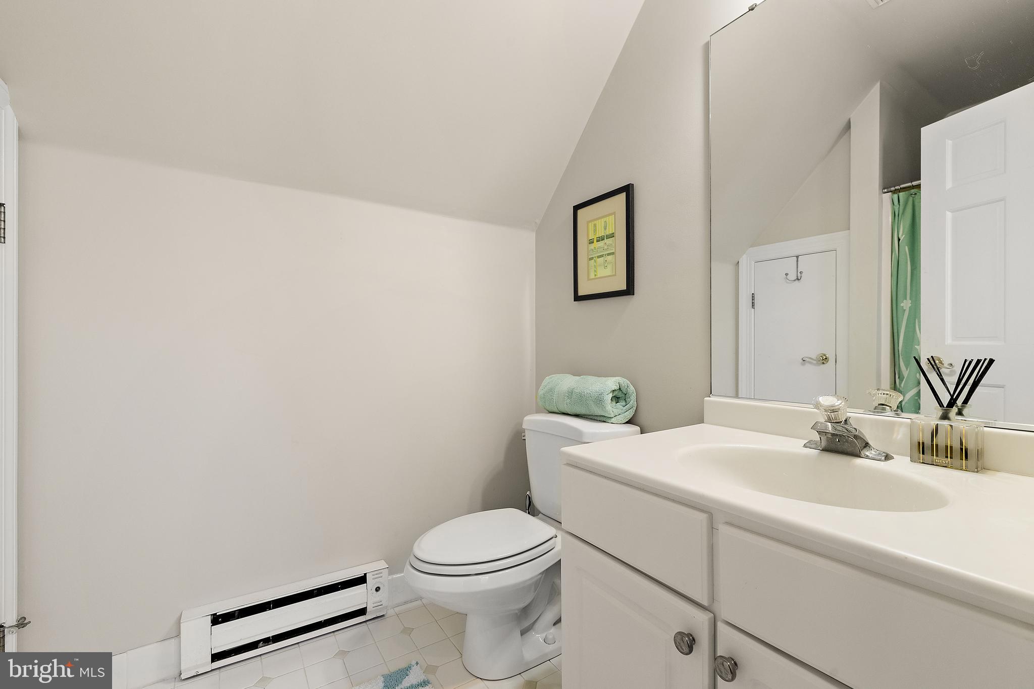 10 Pheasants Ridge North Wilmington, DE 19807 - Photo 47 of 69 a bathroom with a toilet a sink and mirror