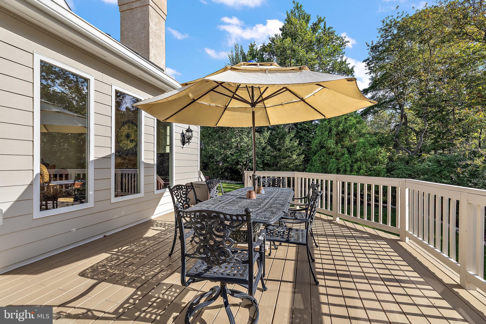 10 Pheasants Ridge North Wilmington, DE 19807 - Photo 54 of 69 a view of backyard with outdoor seating and wooden floor