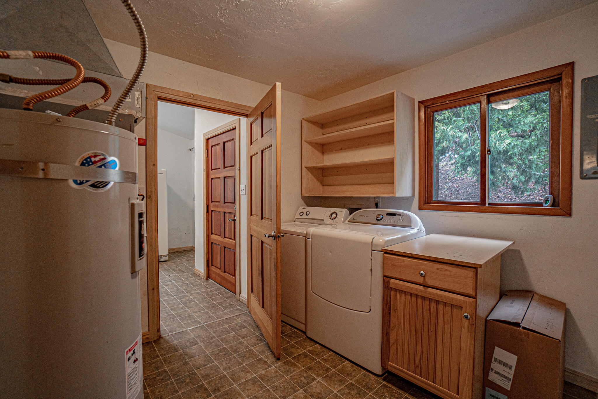 2728 Anderson Creek Road Talent, OR 97540 - Photo 12 of 45 a view of a storage and utility room with washer and dryer