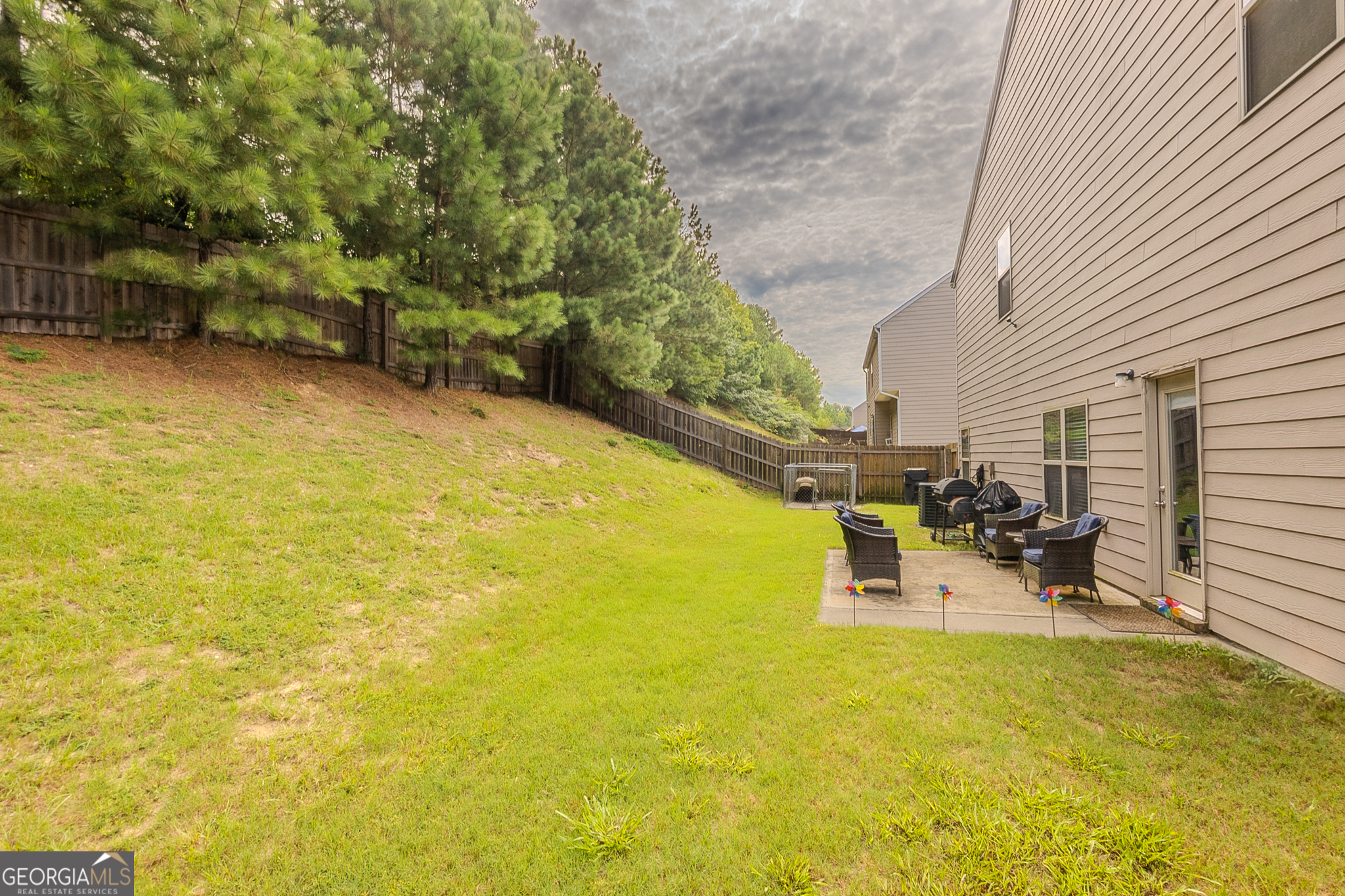 1180 Lehavre Court Hampton, GA 30228 - Photo 39 of 43 a view of a swimming pool with a patio