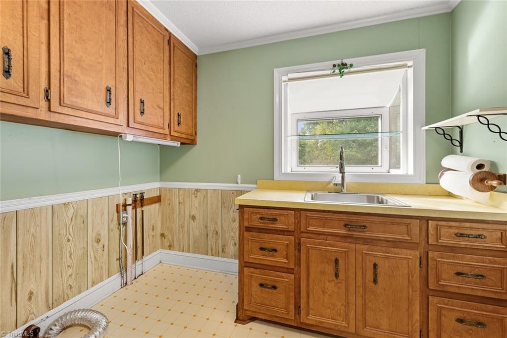 207 Forest Drive Graham, NC 27253 - Photo 29 of 34 Laundry Room.