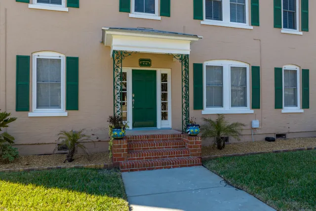 a house view with a garden space