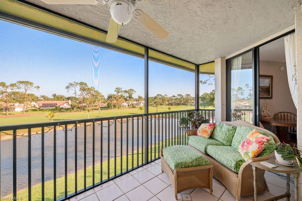 415 Augusta Boulevard, Unit 309 Naples, FL 34113 - Photo 27 of 36 a balcony with furniture